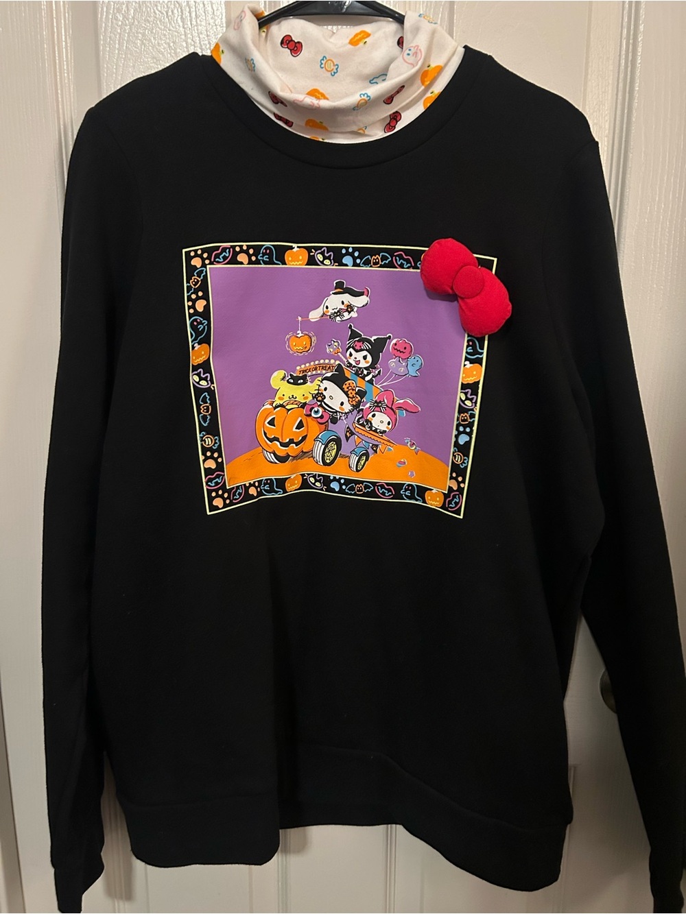 Hello Kitty and Friends Black Crewneck Sweatshirt with Red Bow Accent